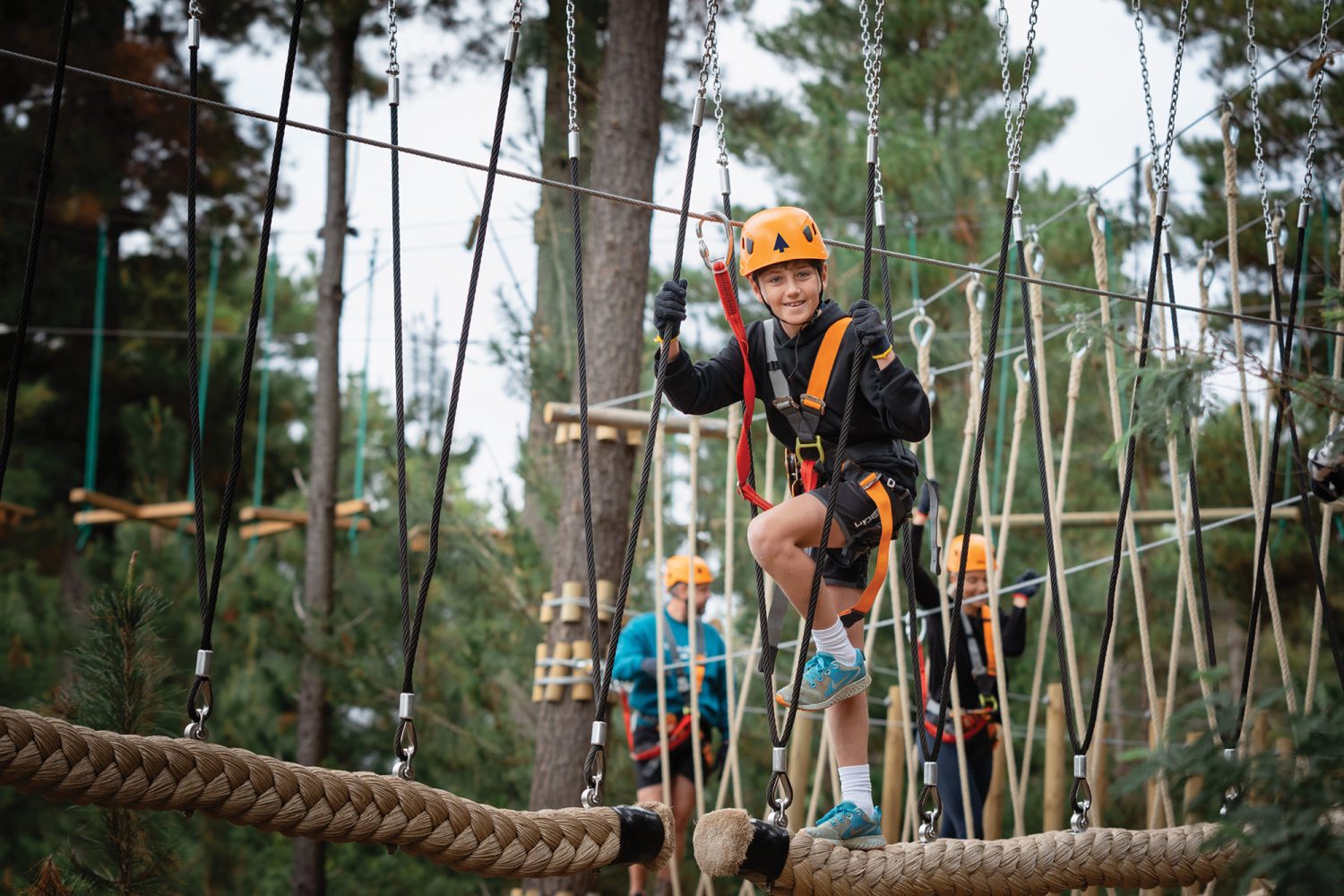 Treetops Canberra - Boy climbing
